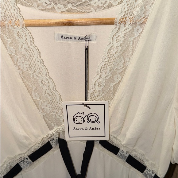 Aaron & amber V Neck Lace Insert Midi Dress
with Bow - Picture 10 of 12